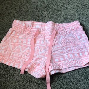 Light pink shorts with Aztec design
